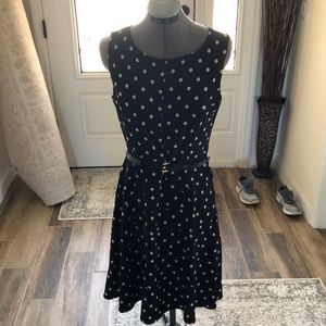 Short sleeve polka dot dress with belt. Never been worn